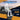 Rainier Parts EZGO RXV black golf cart flip seat kit shown with durable, stylish rear seat for comfortable riding.