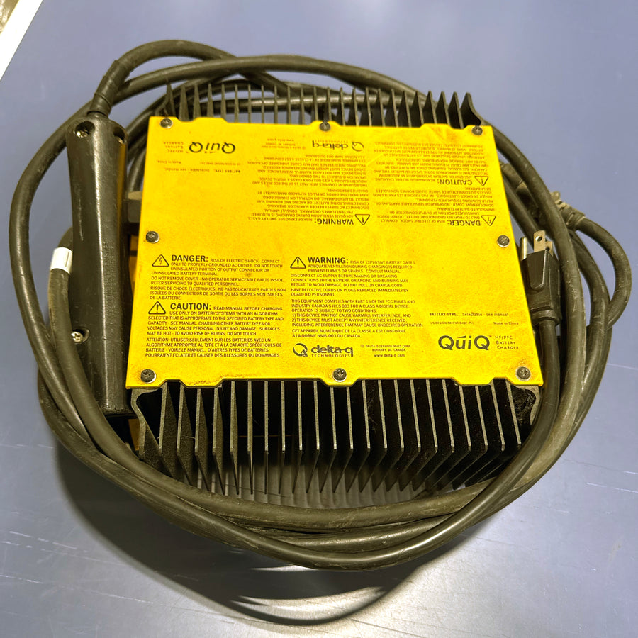 Used E-Z-GO OEM 622419 48V 16A battery charger, showing its power cord and label, designed for electric golf carts.