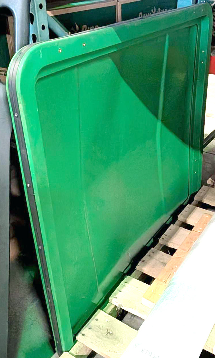 John Deere OEM canopy in green with some wear, showing the fabric canopy's texture and signs of use.