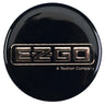 E-Z-GO OEM round decal for golf carts, model-specific exterior upgrade with black and white design on a golf cart.