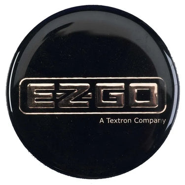 E-Z-GO OEM round decal for golf carts, model-specific exterior upgrade with black and white design on a golf cart.