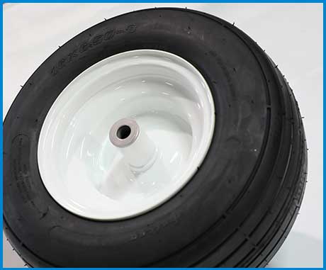 Greens Groomer TWB replacement tire and wheel kit with bushings for durable lawn equipment maintenance and repair.