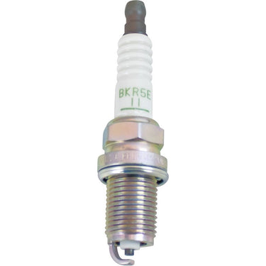 Stens NGK BKR5E11 spark plug for small engines and lawn equipment, showing the metal terminal and ceramic insulator.